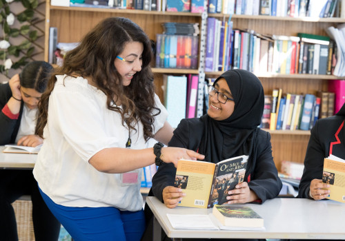 Student and teacher talking