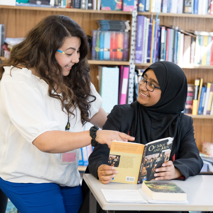 Student and teacher talking