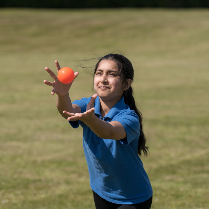 Student catching a ball